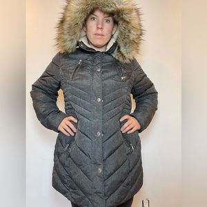 Long puffer jacket with detachable hood and faux fur trim